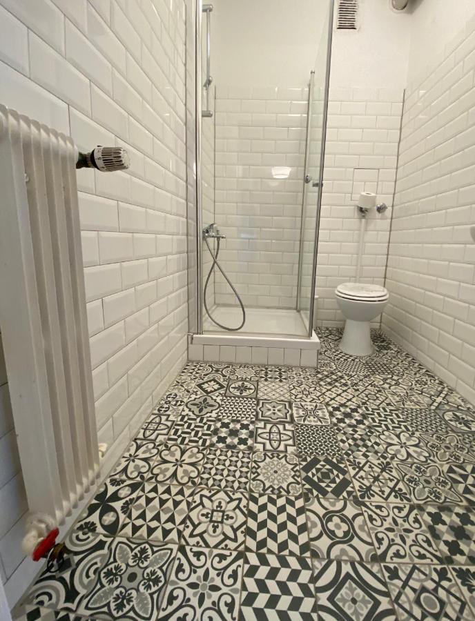 Tm Aparts Dortmund Exterior photo Bathroom floor tiles
