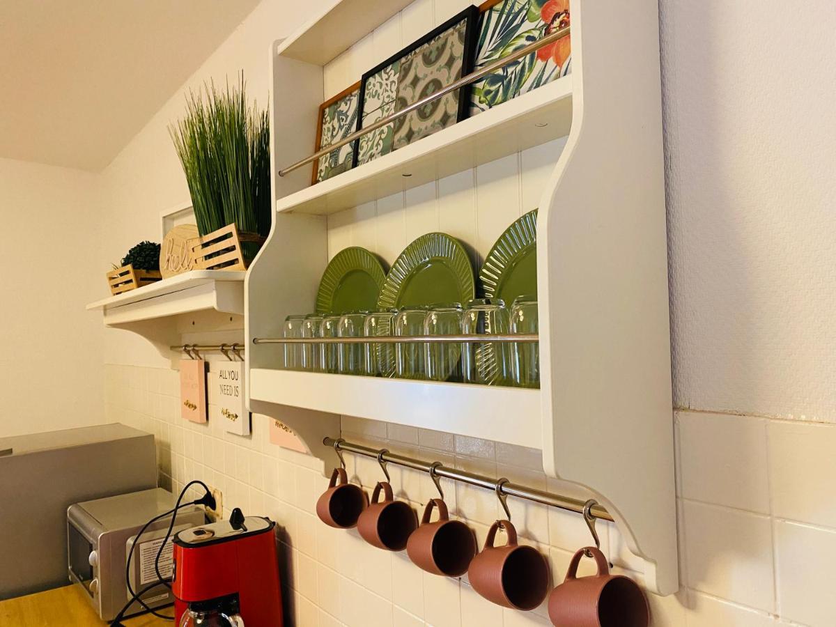 Tm Aparts Dortmund Exterior photo A wall-mounted plate rack